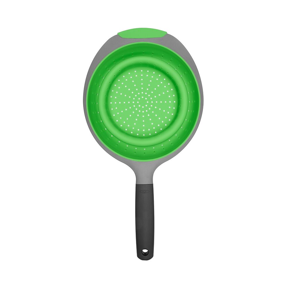 Top down of green collapsible Strainer folded up.  