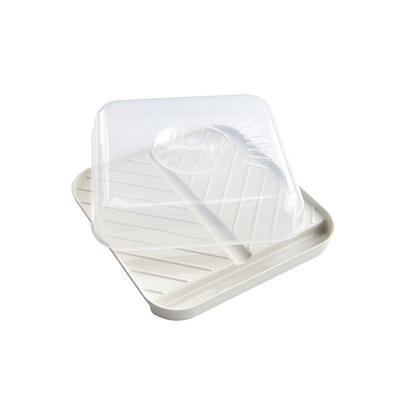 White reusable bacon tray with clear lid on a white background