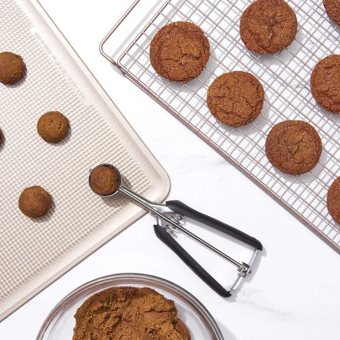 Meet your new baking bestie - the Small Cookie Scoop! This little size 70 wonder holds exactly 1 tablespoon of dough to create adorably uniform 2-inch cookies every single time. Perfect for whipping up bite-sized treats for holiday parties, bake sales where you want to show off, or sneaking extra love into lunchboxes! 