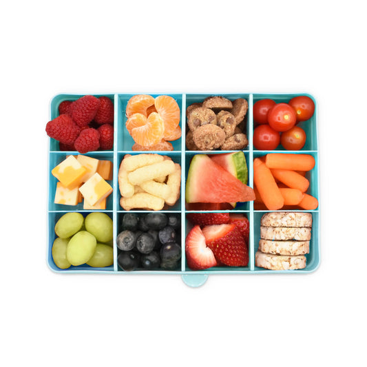 The Snackle Box is the perfect companion for busy parents and adventurous kids who love snacks on the go. Inspired by the design of a tackle box, this innovative snack container features 12 individual compartments, each with removable dividers, creating a customizable storage space for an array of delicious treats.