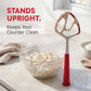 Red kitchen tool next to a bowl of dough on a light surface with text about it standing upright.