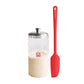 Bread-making container with a red spatula on a white background