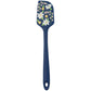Blue spatula with floral design on a white background