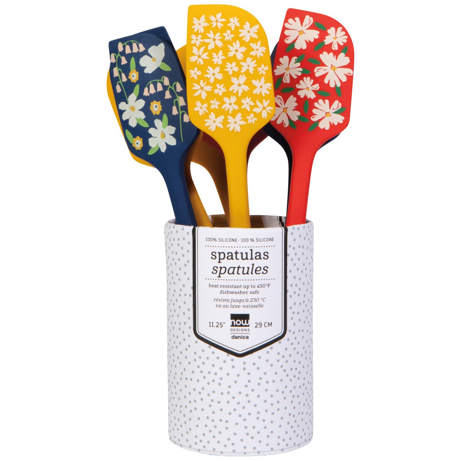 Set of three floral-patterned spatulas in a white container with text.