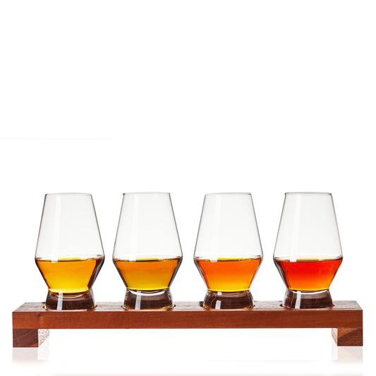 Indulge in an evening of spirit tasting with this elegant Spirit Flight set. This set includes four footed 8 oz. crystal tumblers, and a lightweight but sturdy wooden flight board so that you can transport and enjoy your whiskey and Scotch with ease.