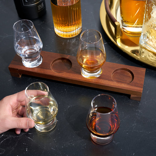 Indulge in an evening of spirit tasting with this elegant Spirit Flight set. This set includes four footed 8 oz. crystal tumblers, and a lightweight but sturdy wooden flight board so that you can transport and enjoy your whiskey and Scotch with ease.