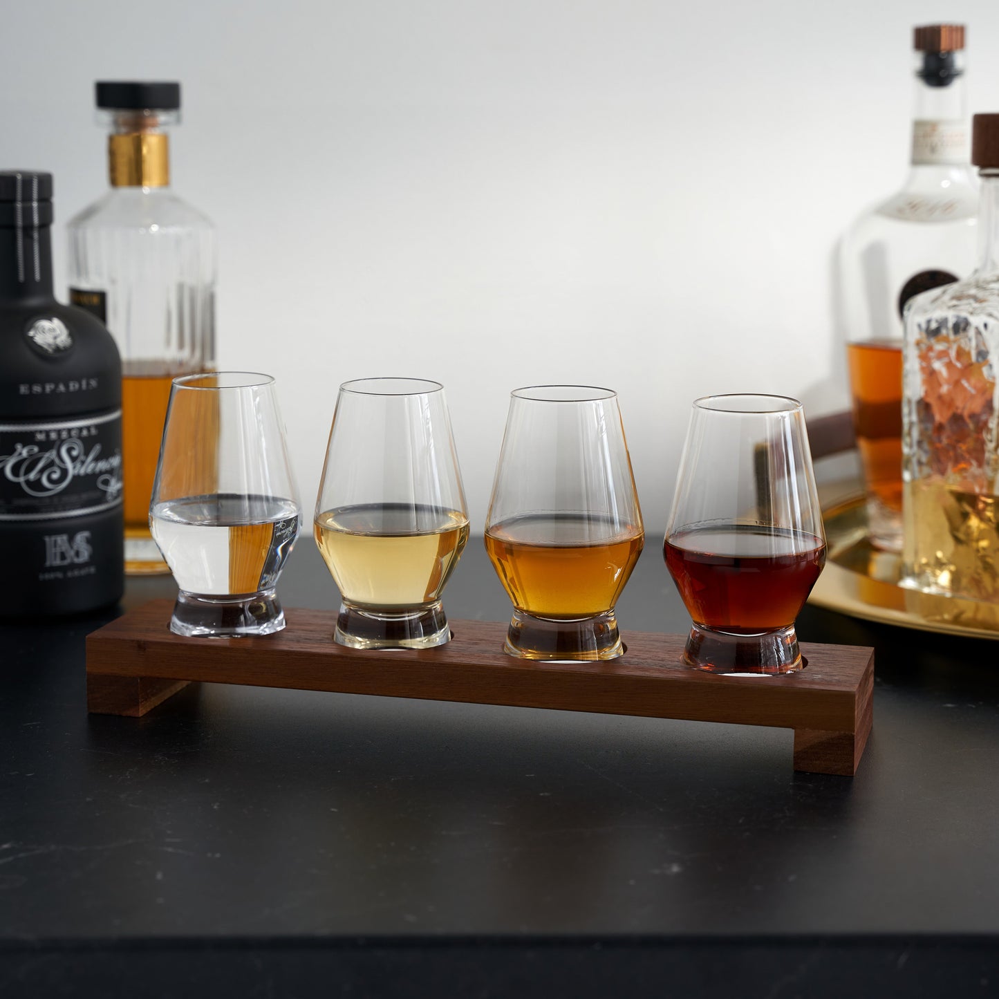 Indulge in an evening of spirit tasting with this elegant Spirit Flight set. This set includes four footed 8 oz. crystal tumblers, and a lightweight but sturdy wooden flight board so that you can transport and enjoy your whiskey and Scotch with ease.