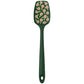 Green spatula with floral pattern on a white background