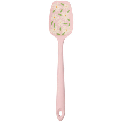 Pink spatula with floral design on a white background