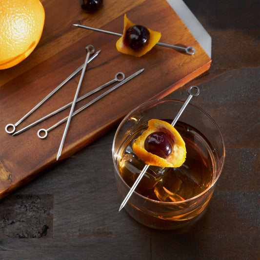 Pick your poison. Each cocktail pick in our classic set of six is finished with a small steel ring; ideal for propping an olive in your martini or a brandied cherry in your Manhattan. Craft a masterpiece and add a flourish to your drinks! With the perfect pick, you’ll be an artist of the spirit world. Cheers!