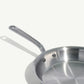 A handle view of a stainless steel frying pan with a stay-cool handle.
