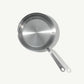 A top view of a stainless steel frying pan with a stay-cool handle.