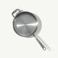 A stainless steel sauté pan with a lid and stay-cool handle, on a white background.