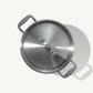 A silver stainless clad stock pot with lid, featuring two handles and a fitted lid, on a white background.