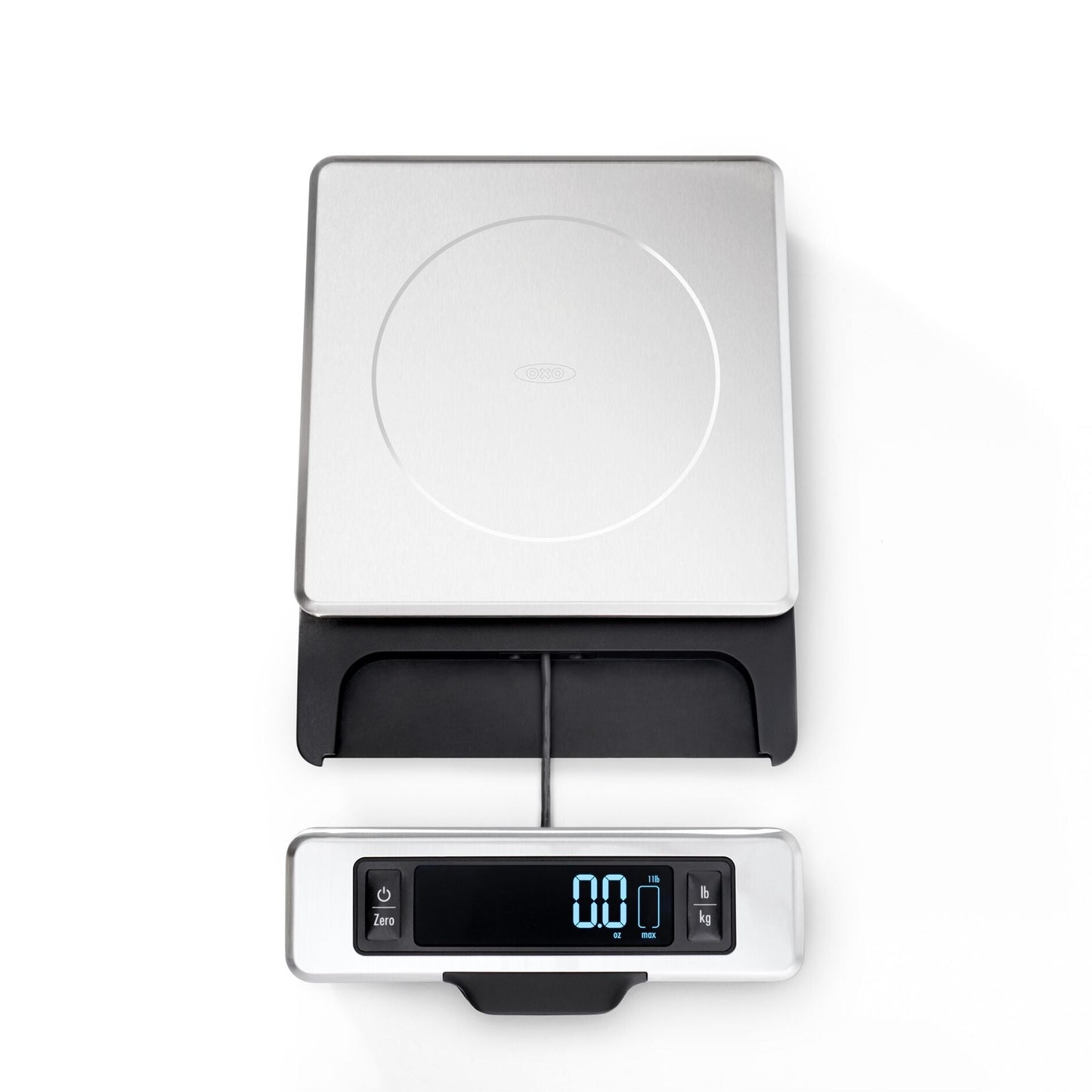 Digital kitchen scale with a detachable face on a white background