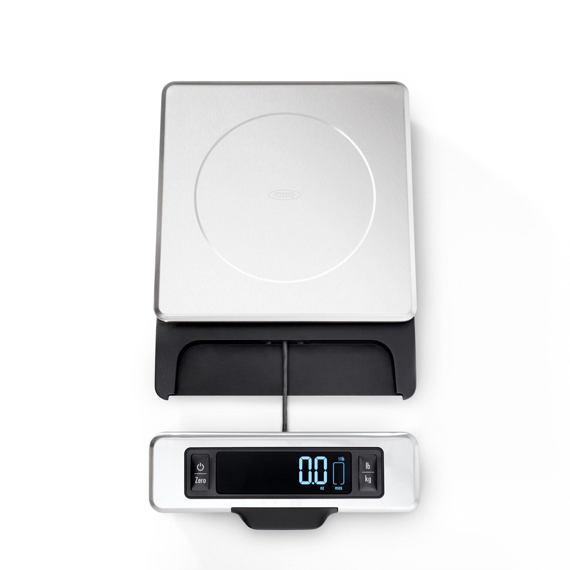 Digital kitchen scale with a detachable face on a white background