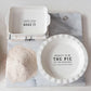 This Round Stoneware Pie Dish, is a celebration of both form and function. Its crisp white surface is emblazoned with the playful saying "Beauty Is In.. THE PIE," making it a conversation starter at any gathering. 