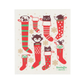 Decorative towel with Christmas-themed animal stockings and snowflakes on a white background.