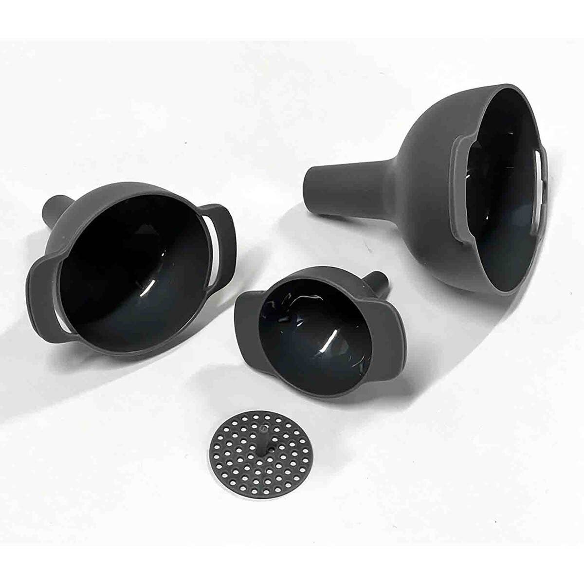 Set of black silicone funnels on a white background