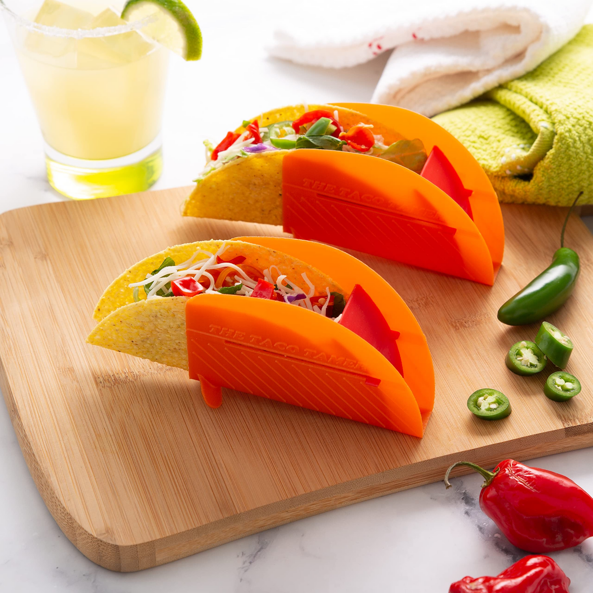his set of four taco tamers is designed to keep your tacos perfectly in place while you load them up with all your favorite fillings. No more taco shells tipping over or falling apart—these tamers keep everything in line, so you can enjoy your meal without the mess.