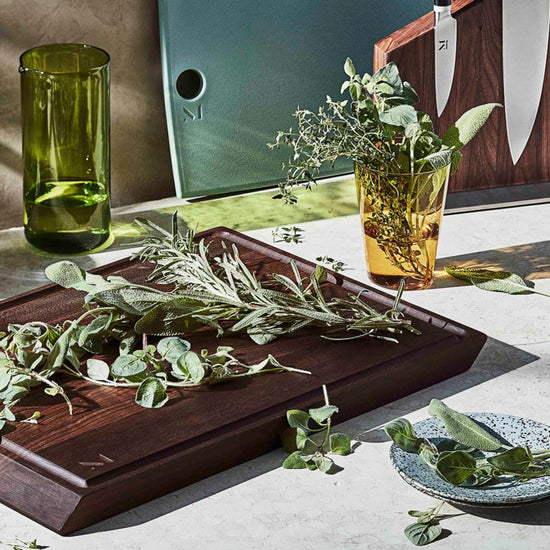 A cutting board you’ll want to display. Our elegant, hefty board is made with FSC-certified wood, and is thoughtfully built for both serious prep and simple serving. With a smooth side and a grooved-side, it’s ideal for cutting a juicy watermelon, carving a steak, or plating charcuterie.