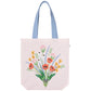 Brighten your day with this charming tote, perfectly sized for everyday essentials and spontaneous adventures. Featuring a soft pale pink base with periwinkle handles and a vibrant spring bouquet graphic, this bag is both stylish and practical. Made from 100% cotton, it offers a sustainable and lightweight carry-all for items like a compact umbrella, cardigan, or running shoes.