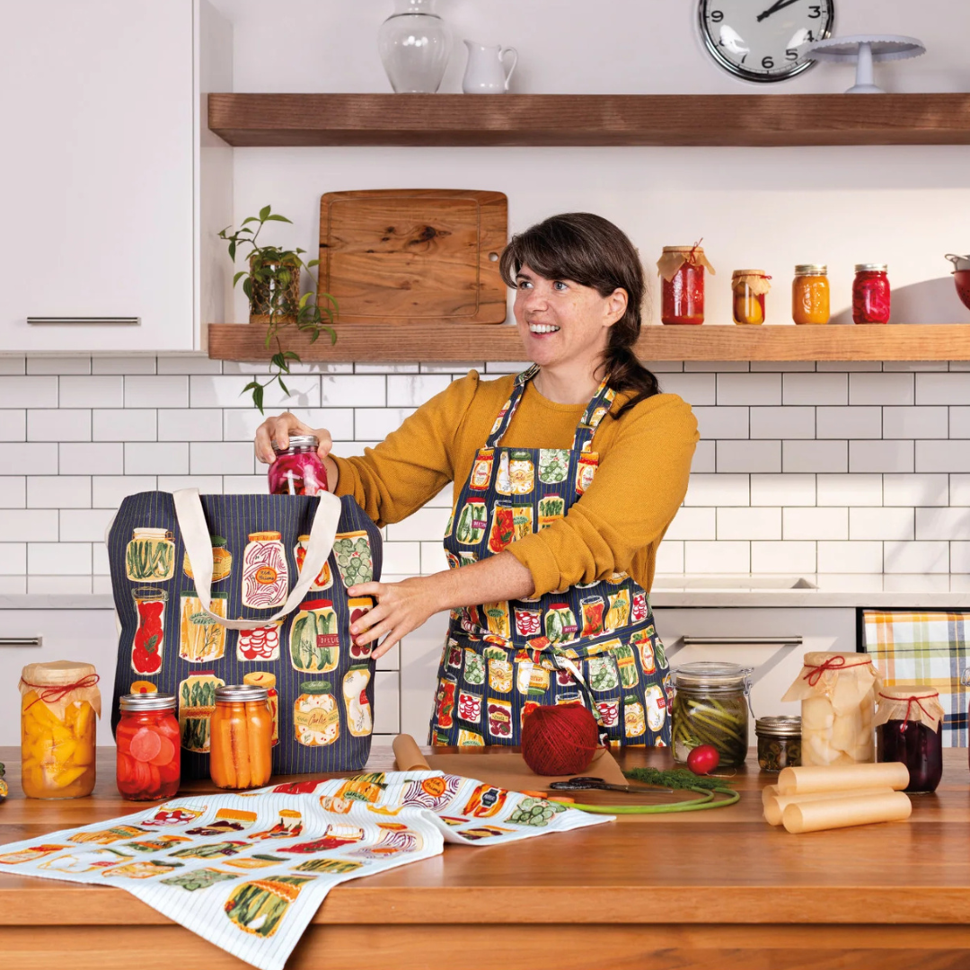 Generous cotton tote bags pack a lot of personality and more. Treasures from the farmer's market, library, or store fit with ease. The reinforced stitching and flat bottom allow for easy packing, and long handles make carrying a breeze.