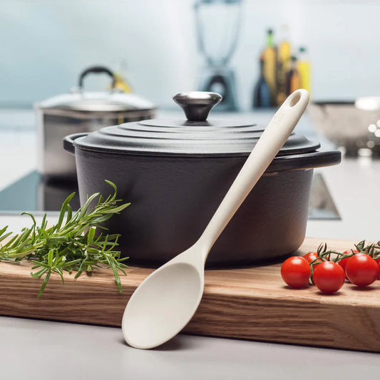 Stir, mix, and cook in style with the Silicone Spoon in Coastal Cream! This modern take on the classic wooden spoon features a solid stainless steel core wrapped in high-grade, BPA-free silicone for a warm, comfortable grip.