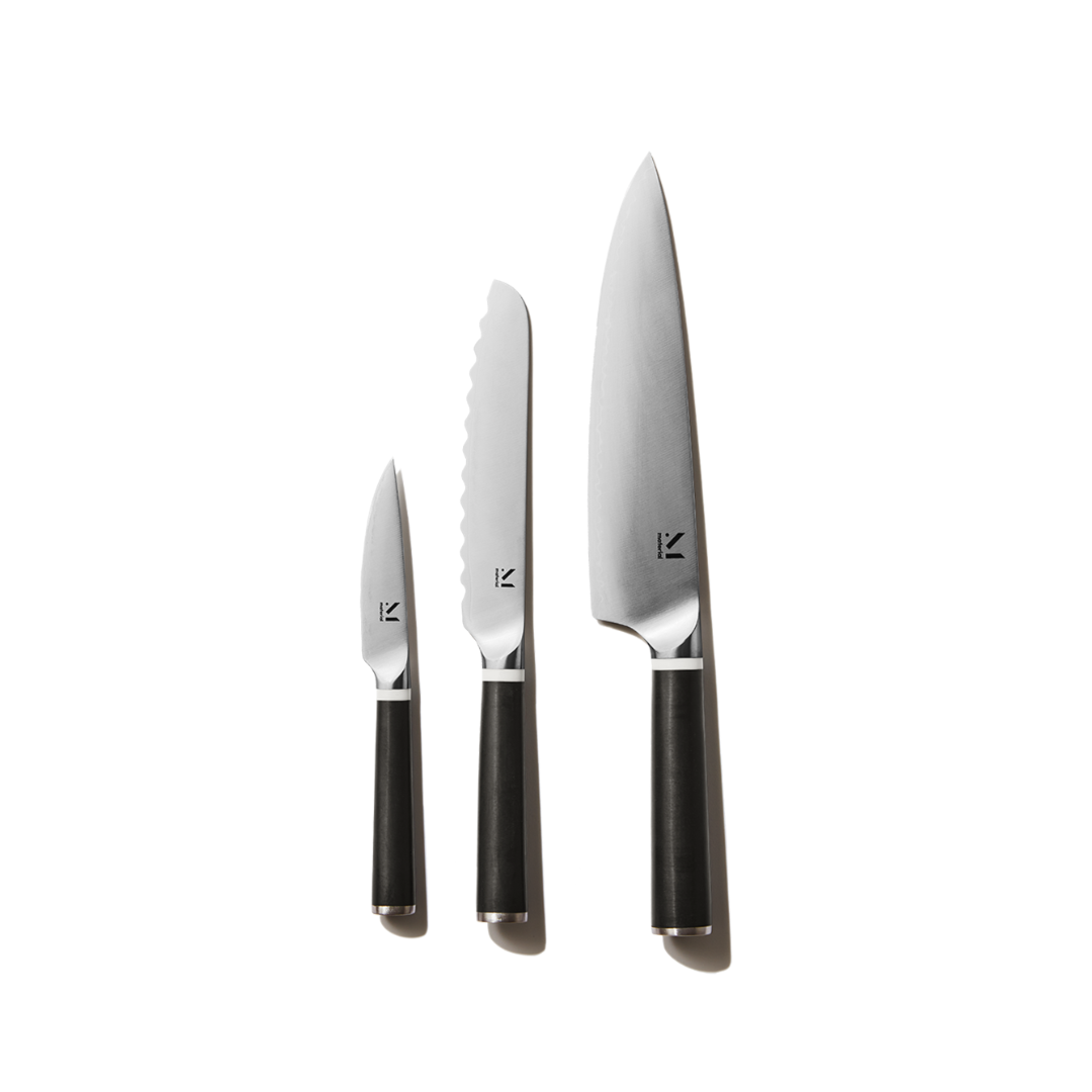 Material Set of three kitchen knives, chef, serrated, and paring. Matte Black Handle. 