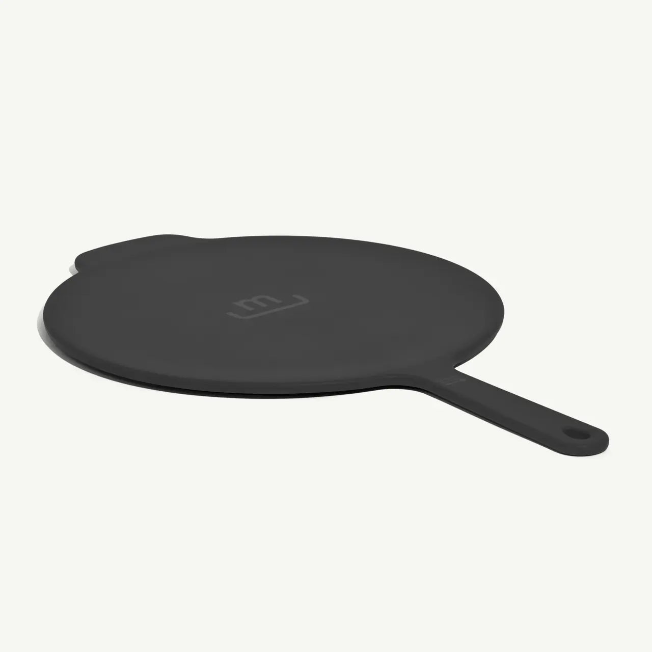  Made In Universal Frying Pan Lid in Grey! Designed to fit every size of Made In Stainless Steel, Carbon Steel, and Non Stick Frying Pans—plus the Made In Wok—this sleek, all-in-one solution helps you simmer, fry, and keep food warm with ease. Crafted with a durable stainless steel interior and a silicone exterior, it grips securely onto your pan while doubling as a trivet to protect your counters. 