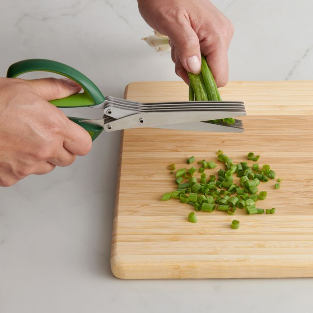 Cut through herbs with ease using Cutlery-Pro's Herb Scissors! 5 stainless steel blades on each side and comfortable handles make them strong, durable, and rust-resistant. Say goodbye to tedious herb prep and hello to fresh flavors in seconds. Perfect for salads, garnishes, and more. Hand wash after use for effortless clean up.