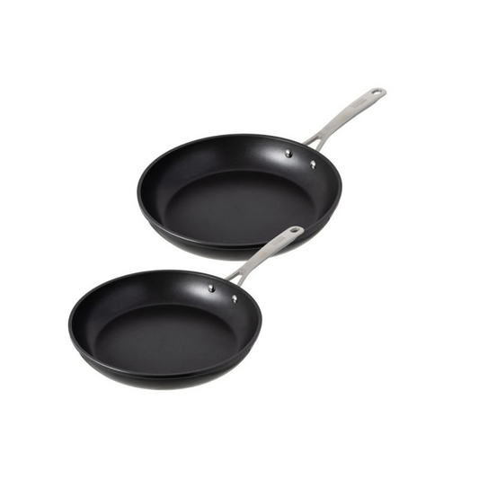 Set of 2 non-stick frying pans by Kuhn Rikon with stainless-steel handles.