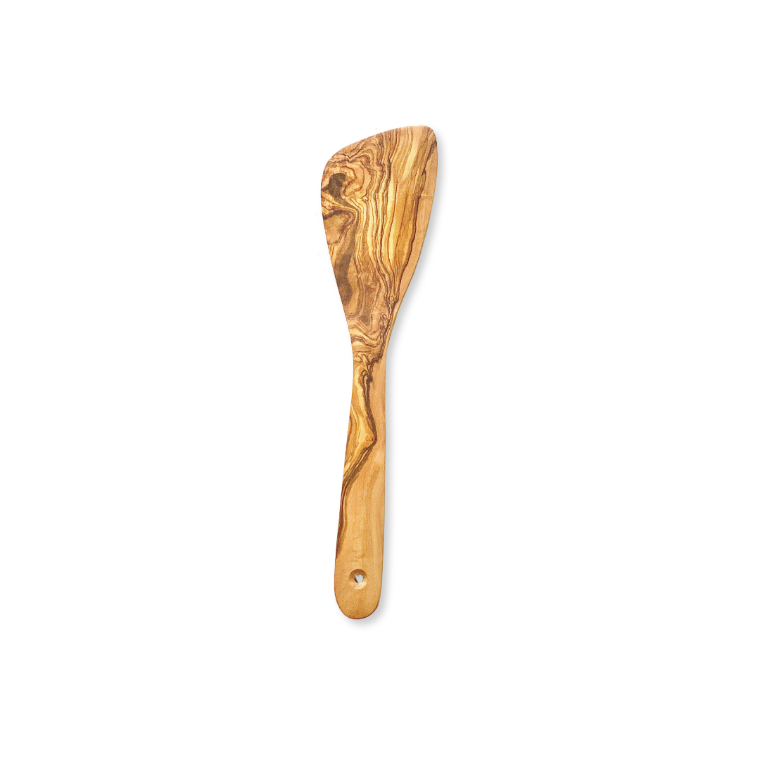olive wood spatulaCrafted from natural olive wood, our seamless All Purpose Spatula is perfect for flipping and serving food without leaving any germs or odors behind. Hand wash and polish with food-safe oil for long-lasting use.