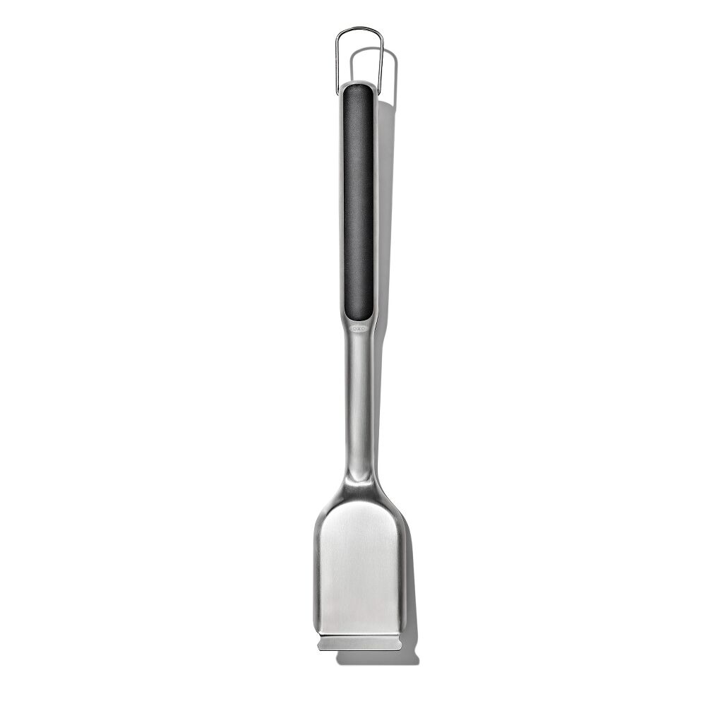 A stainless steel meat tenderizer with a long handle and a hanging loop at the top, shown against a plain white background.