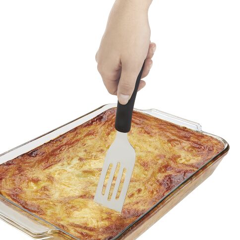 Introducing the kitchen magician you didn't know you needed—our Cut &amp; Serve Turner! This whimsical wonder boasts a razor-sharp front edge and flat, beveled head that glides through lasagna, brownies, and other treats like a hot knife through butter! 