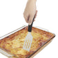 Introducing the kitchen magician you didn't know you needed—our Cut &amp; Serve Turner! This whimsical wonder boasts a razor-sharp front edge and flat, beveled head that glides through lasagna, brownies, and other treats like a hot knife through butter! 