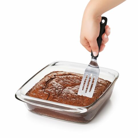 Introducing the kitchen magician you didn't know you needed—our Cut &amp; Serve Turner! This whimsical wonder boasts a razor-sharp front edge and flat, beveled head that glides through lasagna, brownies, and other treats like a hot knife through butter! 