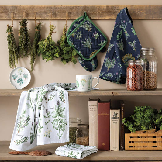 Kitchen shelf with herbs, towels, and books against a beige wall.