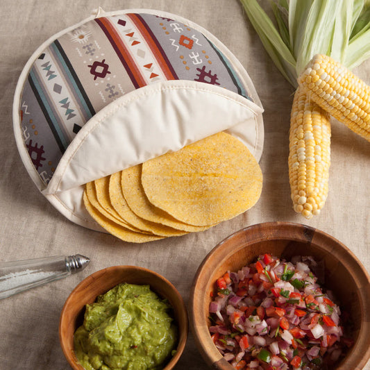 Keep tortillas warm on the table with a special pocket designed just for the task. Simply fill with corn or flour tortillas and place in the microwave for the instructed time. It's like a tortilla hug, just when you need it most! 
