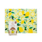 Packaging with lemon design and a smaller product package on a white background