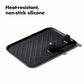 Black heat-resistant, non-stick silicone tray on a white background with text.
