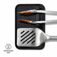 Metal spatula with tongs on a black surface, showing dishwasher safe feature.