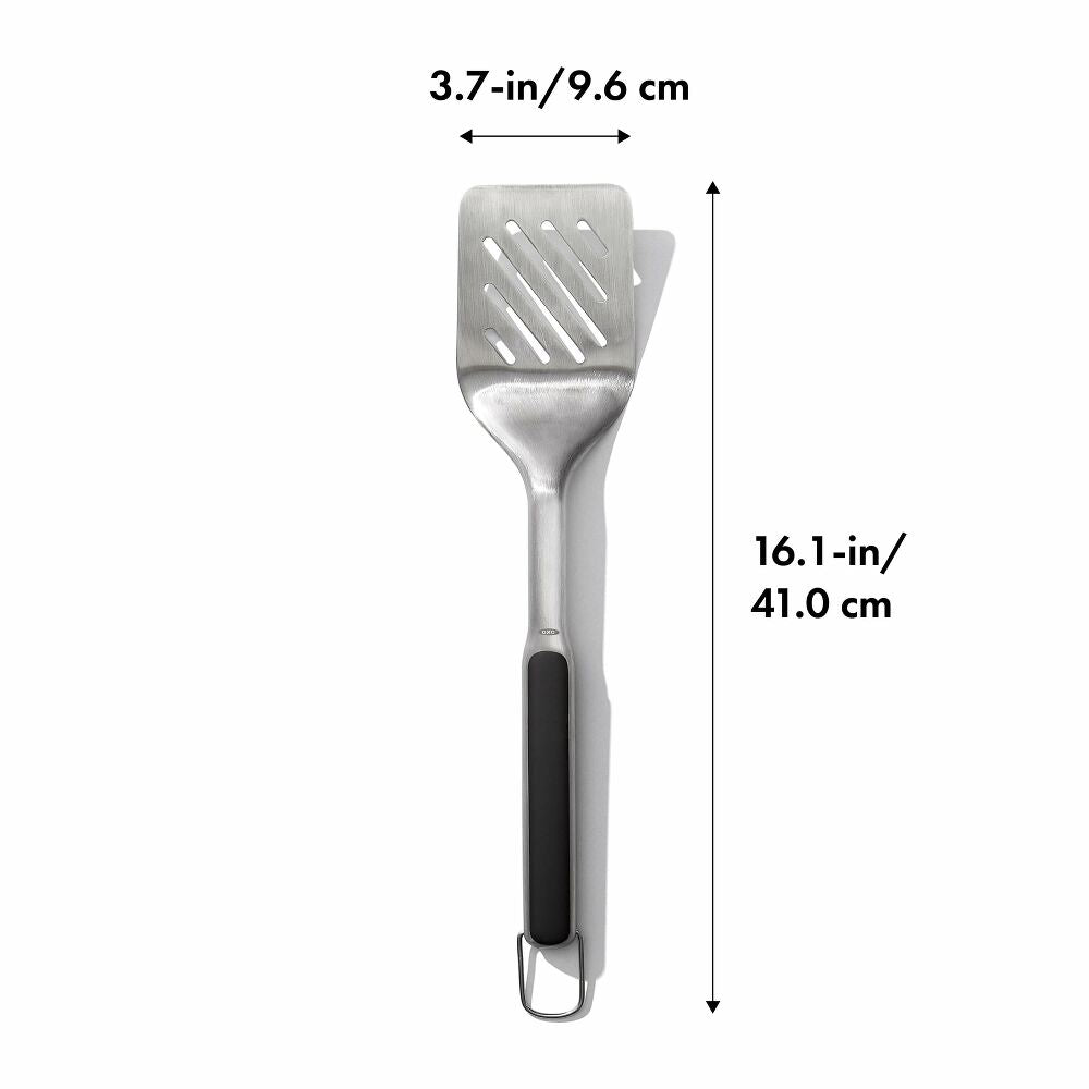Grill spatula with measurements on a white background