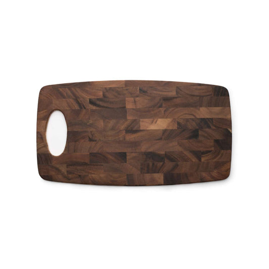 Functional + stylish? Get this beautiful end grain cutting board! Featuring a handle & made from acacia hardwood in stunning hues, this board is gorgeous & durable. End grain won't dull knives quickly as wood grain helps in cutting. Plus, acacia is sustainably sourced, not endangered. And for each harvest, a new tree is planted! Artful & eco-friendly? Count us in!