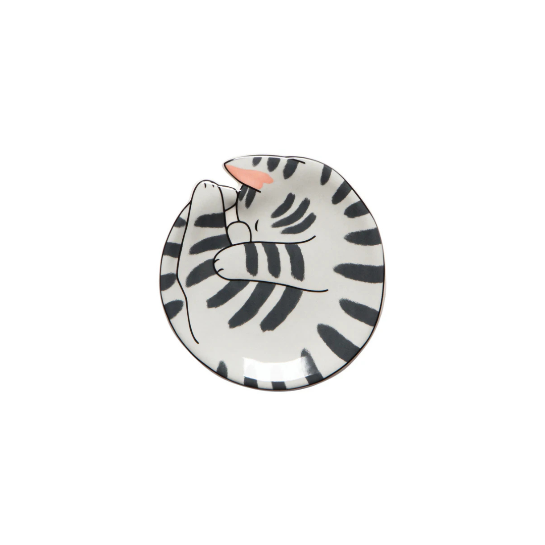 Add a touch of feline charm to your home with the Meow &amp; Furever Trinket Tray in Stripes. Crafted from durable, food-safe New Bone China, this adorable tray features a white cat with black stripes, making it a delightful accent for any decor. 