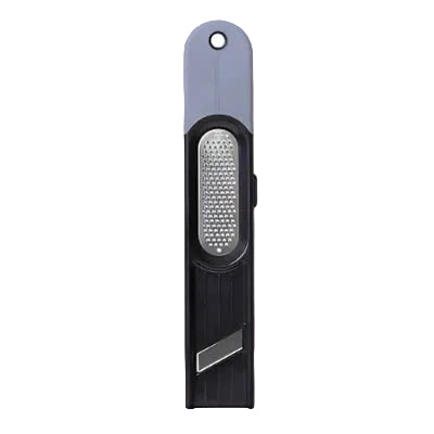 Black and gray handheld grater on a light gray background