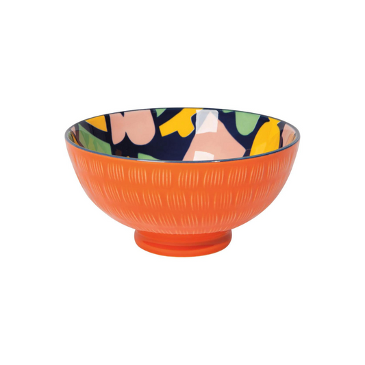 This textured porcelain bowl with bold patterns is as handy as it is beautiful - use it as a normal bowl in the kitchen, as a catch-all by the front door for keys, as a snack bowl, for side salads or pasta, or anything else you can think of! The stamped design and bold hand painted rim provide a decorative pop in any space