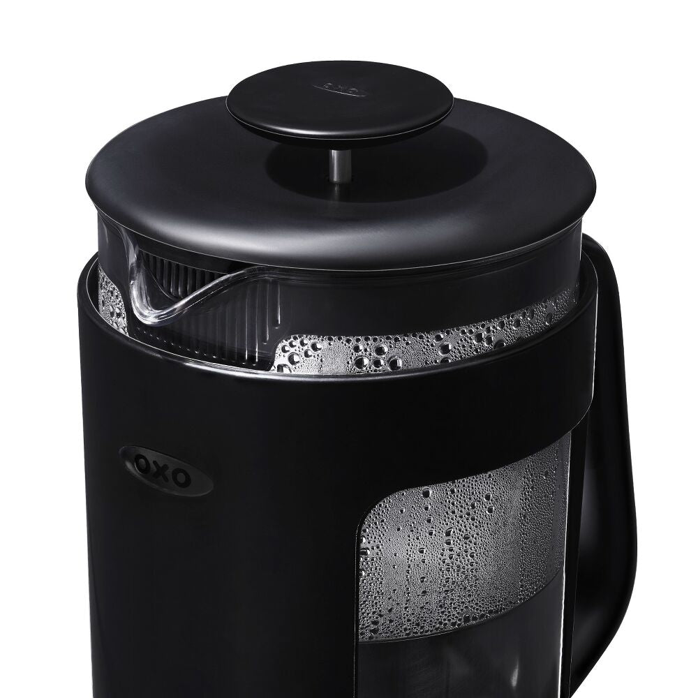Black OXO coffee maker on a white background