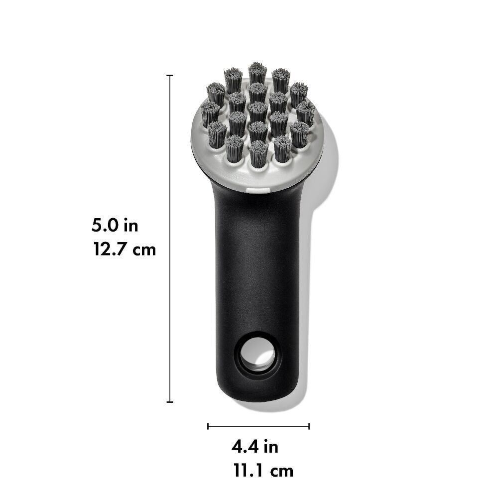 Black grill brush with bristle head and measurements on a white background