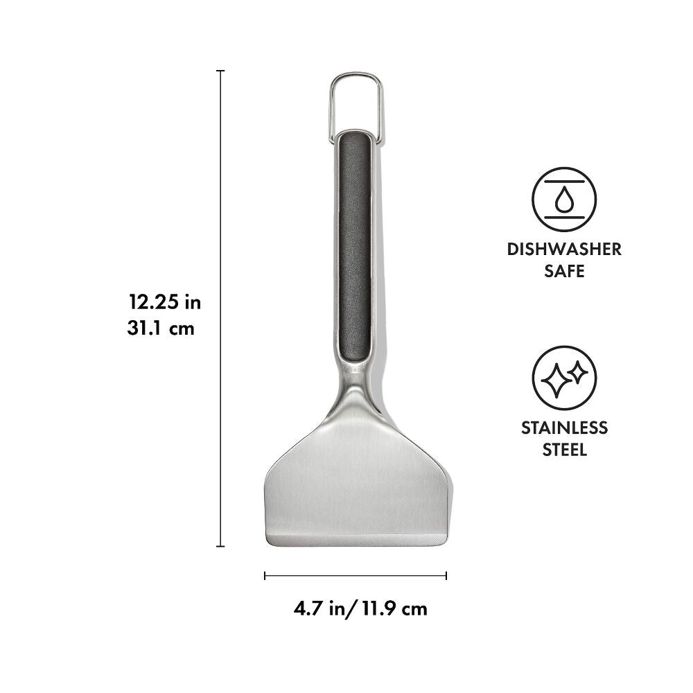 Spatula with measurements and safety icons on a white background